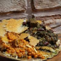 ته دیگ / Tadig (A Persian Favorite) · A layer of crunchy rice topped with your choice of Gheymeh or Ghormeh Sabzi.