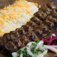 Koobideh /  کباب کوبیده · 1 skewers mixed of fresh ground beef and lamb prepared with onions, herbs, and spices.