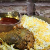  Lamb Shank / چلو ماهیچه · Braised lamb shank slow cooked in a garlic, saffron, and tomato sauce.