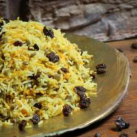  Adas Polo / عدس پلو · Basmati rice cooked with saffron, lentils, and raisins.
