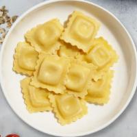 Cheesy Rollin' Ravioli · Fresh ravioli cooked with your choice of sauce, veggies, and meats and topped with black pep...