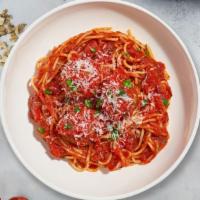 S&M Pasta · Fresh spaghetti and homemade ground beef meatballs served with rossa (red) sauce, red pepper...