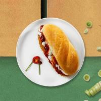 The Chick Parm Sandwich · Perfectly breaded chicken, meat sauce, cheese & parmesan on a hero.