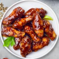 Bbq Bliss Chicken Wings · Fresh chicken wings breaded, fried until golden brown, and tossed in barbecue sauce. Served ...