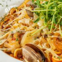 Seafood Pasta · Smoked shrimp, clam, and webfoot octopus with spaghetti and our signature spicy vongole.