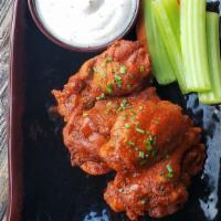 Tavern Jumbo Hot Wings   	 · House specialty, choice of sauces: Mild, Spicy, BBQ, Lemon Pepper Honey 
served with Ranch d...