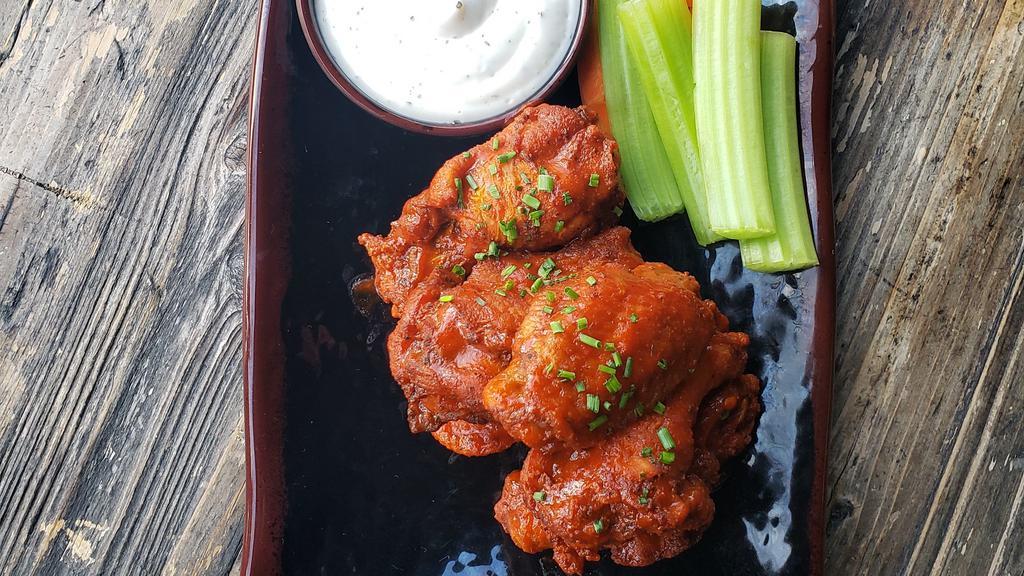 Tavern Jumbo Hot Wings   	 · House specialty, choice of sauces: Mild, Spicy, BBQ, Lemon Pepper Honey 
served with Ranch dressing, fresh celery and carrots
