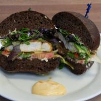 Chipotle Sandwich · Toasted bread with provolone cheese, chipotle aioli, onions peppers, tomatoes mixed greens.