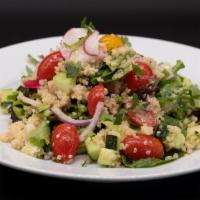 Quinoa Salad · Spring mix, quinoa, cucumber, tomatoes, onions, cilantro.
