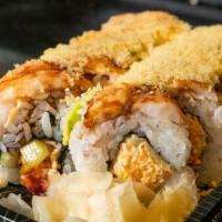 Crounching Tiger Roll · In spicy crab, shrimp tempura top with avocado, eel sauce, spicy mayonnaise, and cunch.