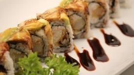 Hidden Dragon Roll · In shrimp tempura and crab. Top with eel, avocado, and eel sauce.