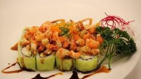 Baked Lobster Roll · In CA roll top with baked crawfish, eel sauce, masago, and green onion.