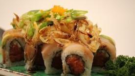 Lakers Roll · In spicy tuna and cucumber. Top with albacore, avocado, jalapeno, fried onion, and spicy gar...