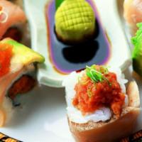 Albacore Lover Roll · In albacore, crab, and cucumber. Top with avocado and spicy garlic ponzu.