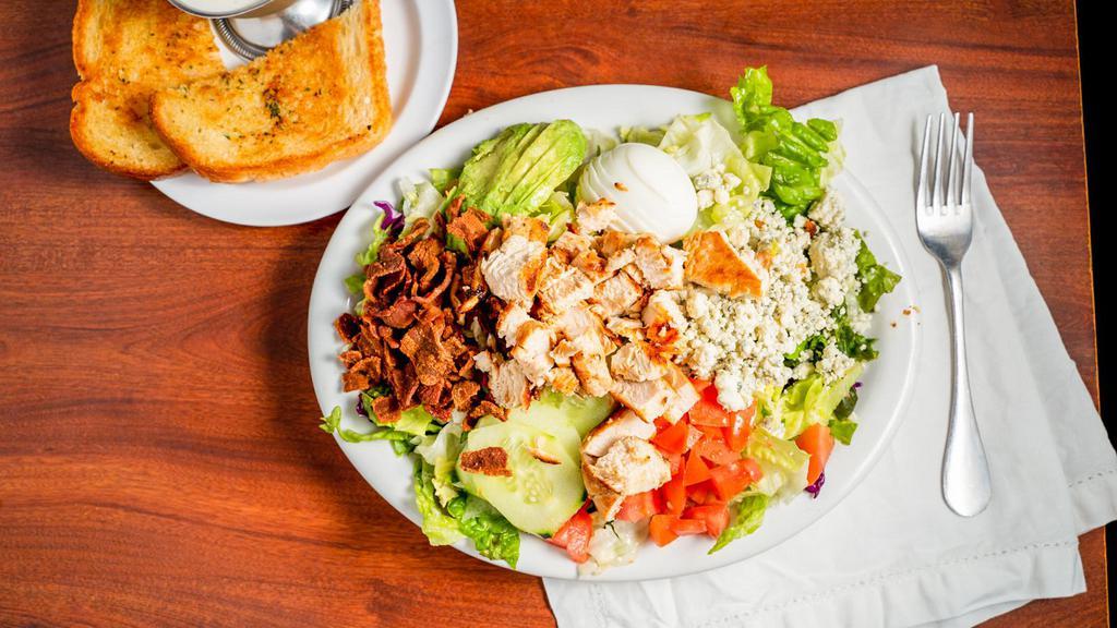 Cobb Salad · grilled chicken, iceberg lettuce, blue cheese crumbles, applewood bacon, avocado, tomato, egg, ranch dressing