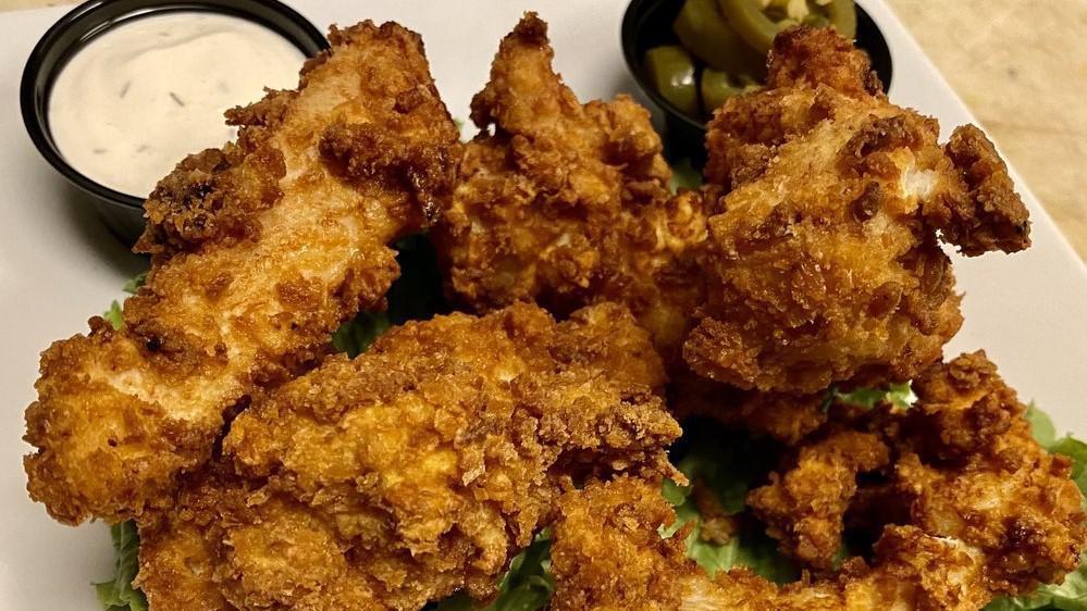 Chicken Strips (5) · Hand breaded chicken strips served with regular couch potatoes and ranch dressing or BBQ sauce.