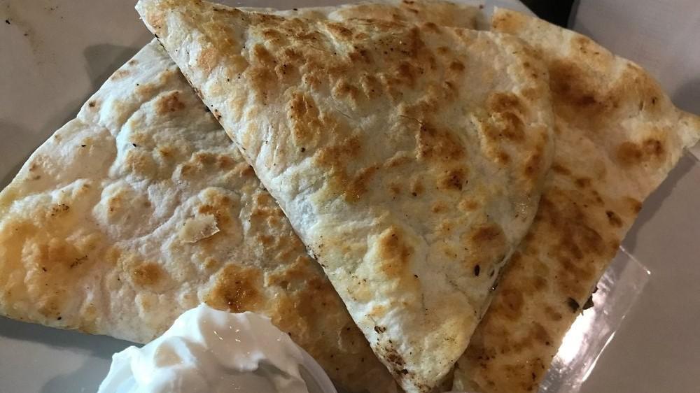 Quesadilla · Choice of pulled pork, chicken, cheese or ground beef on 12