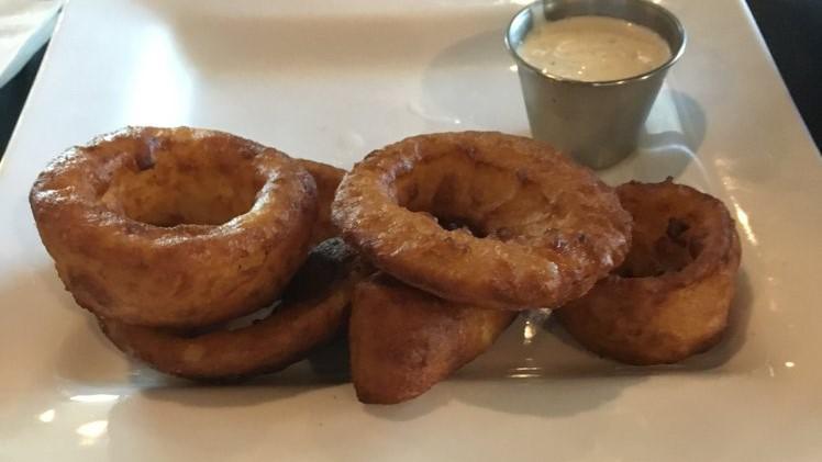 Onion Rings (7) · Beer battered onion rings served with ranch dressing or ketchup.
