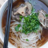 Natural Oxtail Pho · Beef oxtail broth. Served with rice noodles, bone in natural beef oxtail, shaved white onion...