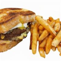 House Beef Sandwich · A Slice of American and Swiss Cheese Melted onto Two Beef Patties, Topped with a Fried Egg, ...