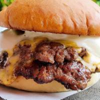 Daygo Double · Two 8 oz angus sirloin patty, lettuce, tomato, grilled onions, and house secret sauce.