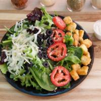 Spring Salad · Mixed greens, fresh sliced tomatoes, mozzarella cheese, black olive, and seasoned croutons.