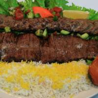 Beef Soltani · A combination of one flattened filet mignon and one skewer of beef koobideh.