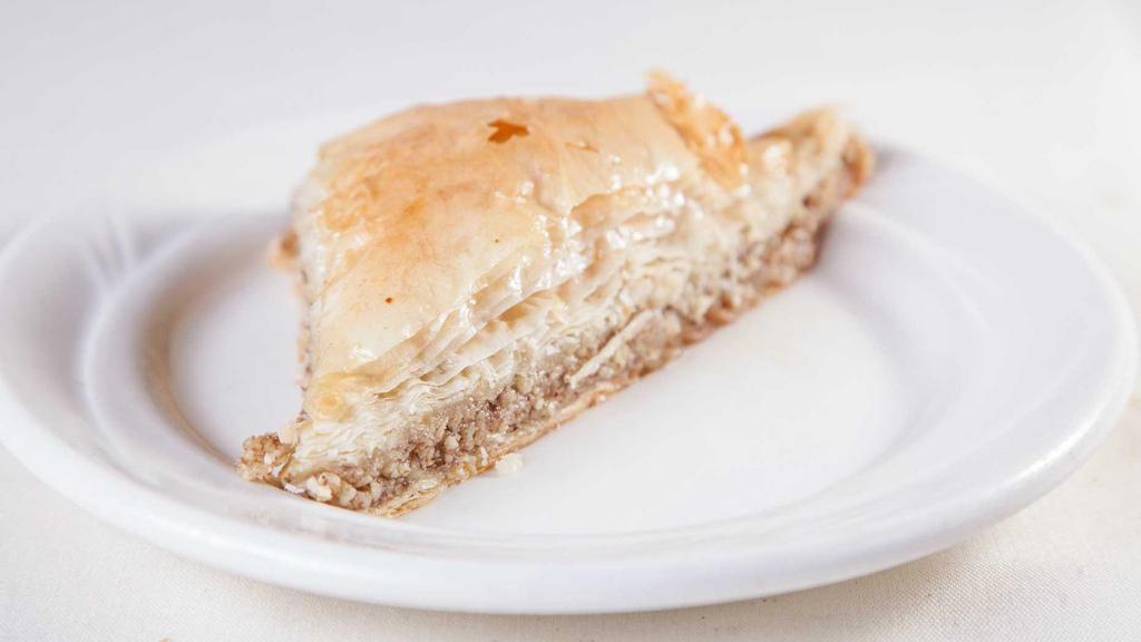 Baklava · House-made puff pastry with walnuts and pistachio.
