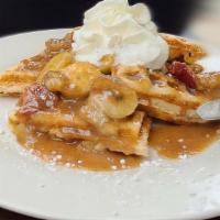 Banana Foster Waffle · Bananas, walnuts cinnamon sugar syrup, whipped cream.