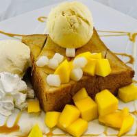 Small Mango · small scoop of mango and vanilla ice cream by default, fresh mango bites and mini mochi, swe...