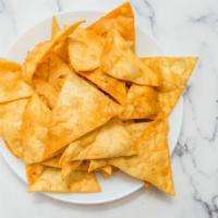 Pita Chips · House made pita bread, fried till golden and crispy!