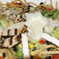 Mexican Chicken Caesar Salad · Grilled Chicken breast, romaine lettuce, avocado, tomato, black beans, grilled corn, shave p...