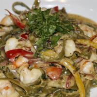 Fettuccine Tequila Pasta · Spinach fettuccine noodles, in a creamy tequila lime sauce with tri-color bell peppers and r...