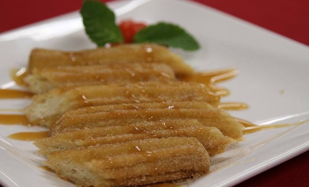 Mexican Churros · Rolled in cinnamon sugar. Served with Cajeta. (caramel)