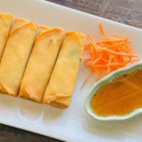 Thai Egg Rolls · Crispy-fried & stuffed with cabbage, and carrots, served with a sweet & sour sauce.