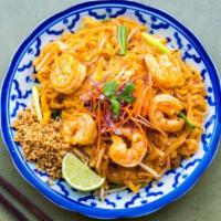 Pad Thai · A famous thai dish combining rice noodles, tamarind sauce bean sprouts, egg, scallions, red ...