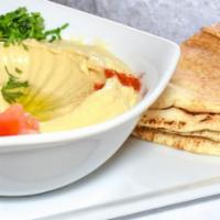 Hummus · Ground garbanzo beans, garlic, lemon juice, special pi seasonings