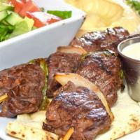 Beef Kabab Platter · Gluten free. Grilled beef kebab style with chopped tomatoes, pickled turnips, tahini sauce