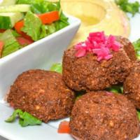 Falafel Platter · Vegan. 5 ground fava bean and garbanzo fritters chopped tomatoes, fresh parsley, tahini sauce