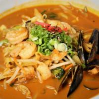 Spicy Seafood Noodle · Assorted Seafood Ramen with house spicy soup.
