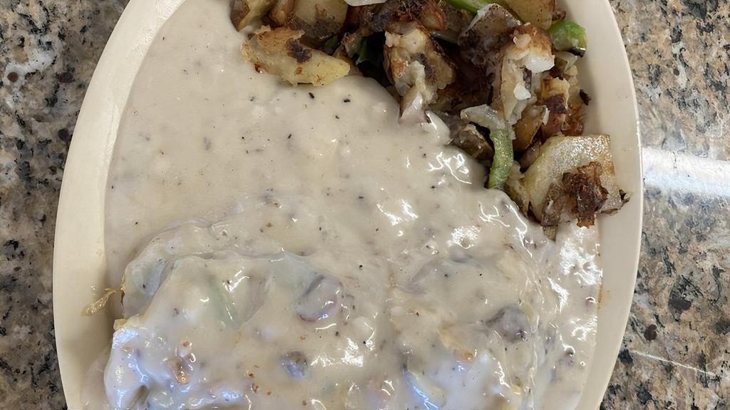 Okie Special · Scramble eggs, onion, bell pepper, and sausage over two biscuits top with gravy. With country potatoes or hash browns and your choice of toast or biscuit and gravy.
