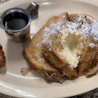 French Toast (1/2 ) · Two slices of French toast. With country potatoes or hash browns and your choice of toast or...