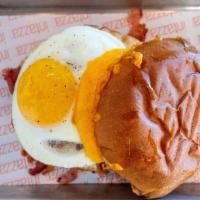 Good Morning America · Local favorite. Fried Egg, Crumbled Bacon, Cheddar, Provolone, and Tomato, Garlic Aioli on a...