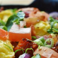 Sunrise Skillet · Scrambled Eggs, Fresh Tomato, Sun-Dried Tomatoes, Onion, Spinach, Green Onion. Add protein f...