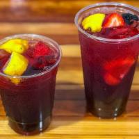 Citrus Berry Punch · Herbal berry and hibiscus tea, muddled blackberries, raspberries, a squeeze of lemon and sim...