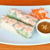 Goi Cuon/Spring Rolls · Rice paper rolls with pork, shrimp, rice vermicelli,. lettuce and fresh herbs. Served with p...