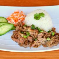 Com Thit/Pork · Grilled Pork with jasmine rice served with a side of cucumber, pickled. carrots/daikon and f...