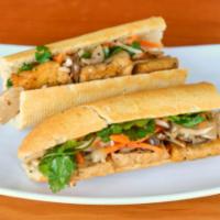 Banh Mi Chay/Vegetarian · Grilled Tofu & Organic Varietal Oyster Mushrooms 12” baguette warm french baguette served wi...