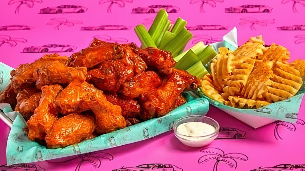 Major Game Day Pack: 30 Piece · 30 Classic Bone-in or Boneless wings with choice of 2 flavors, regular fries and 2 dips.