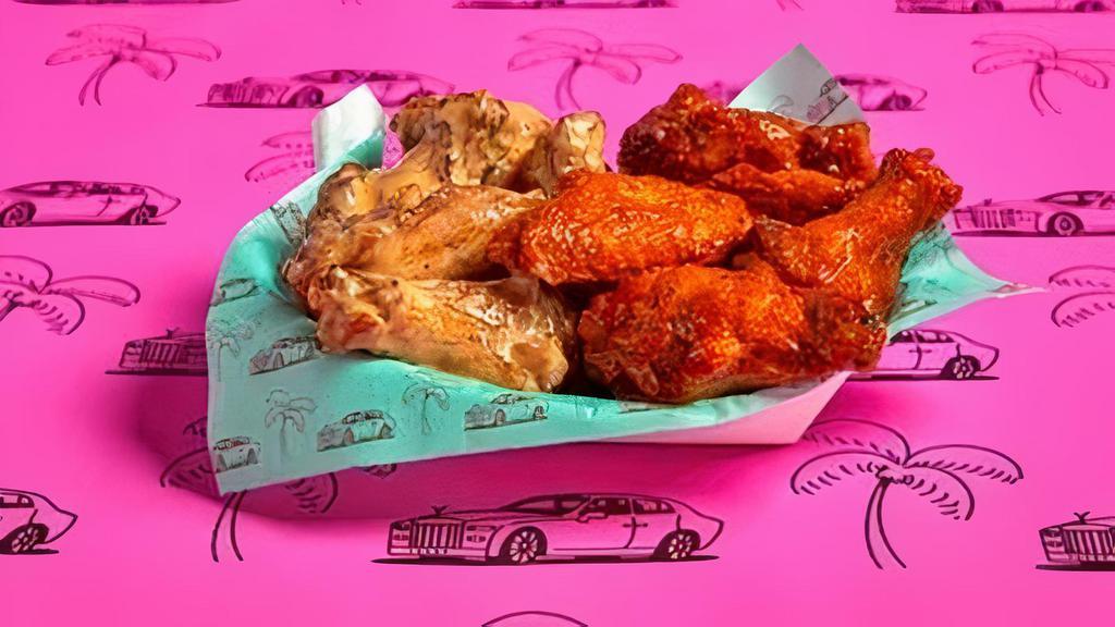 10 Wings · 10 Classic Bone-in or Boneless wings with choice of 1 flavor and 1 dip.
